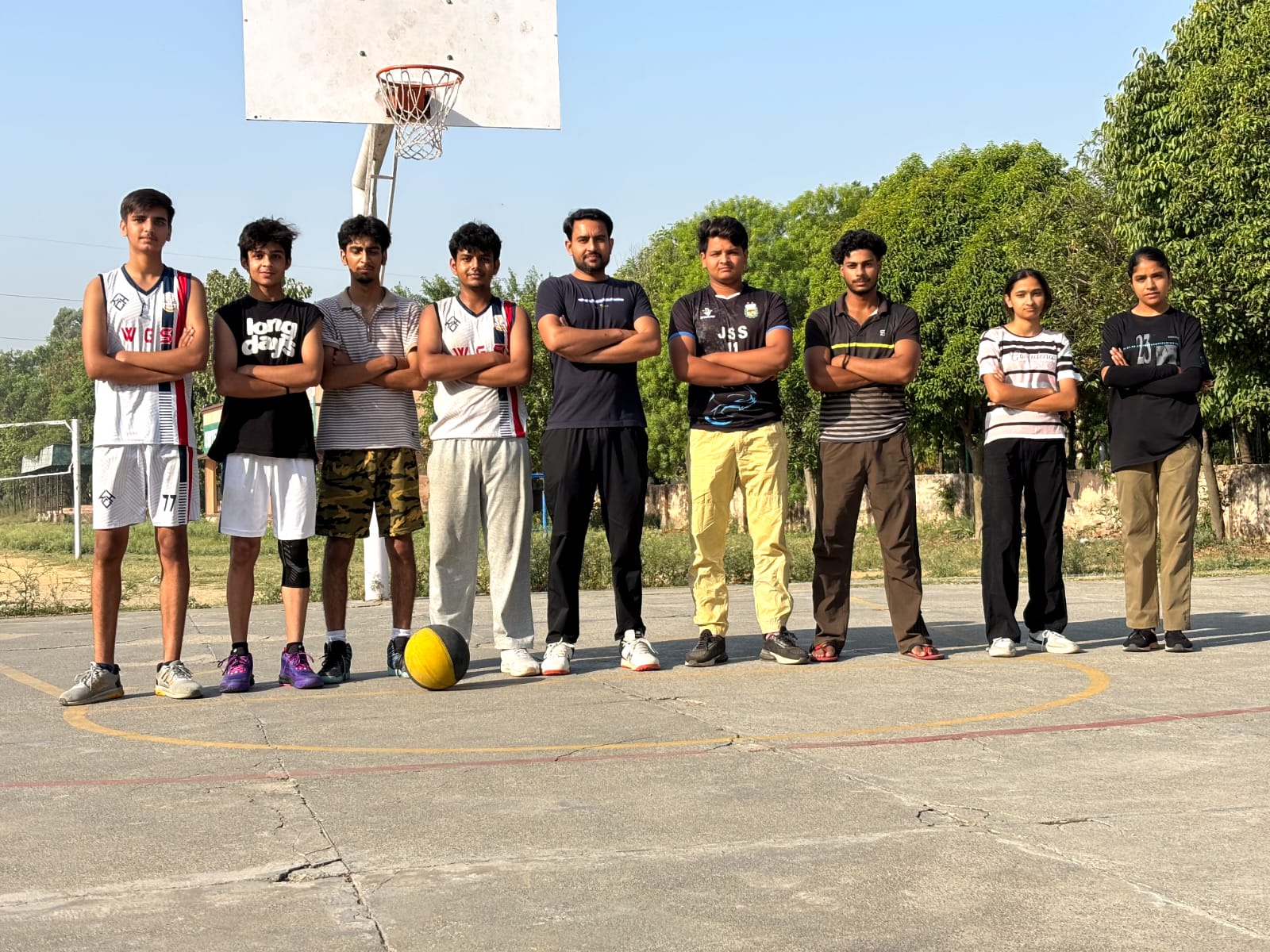 Sports PEFI basketball team lineup with founder